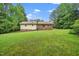 Backyard with patio and grass at 4006 Daniel Rd, Durham, NC 27703