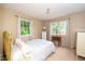 Bedroom featuring windows with white curtains and a white dresser at 4006 Daniel Rd, Durham, NC 27703