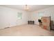 Empty bedroom featuring a hanging light fixture and two windows at 4006 Daniel Rd, Durham, NC 27703