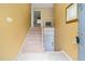Inviting foyer with a staircase and access to the upper level, showcasing a warm color palette at 4006 Daniel Rd, Durham, NC 27703