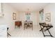 Bright eat-in kitchen area featuring hanging chandelier and windows at 4006 Daniel Rd, Durham, NC 27703