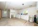 Spacious laundry room featuring a washer, dryer, sink, and ample storage space at 4006 Daniel Rd, Durham, NC 27703