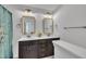 Elegant bathroom features a dual sink vanity, contemporary lighting, and sleek modern design at 407 Collier St, Smithfield, NC 27577
