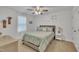 Charming bedroom featuring a comfortable bed, soft natural light, and neutral decor at 407 Collier St, Smithfield, NC 27577