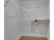 Large walk-in closet boasts lots of shelving, storage, and space for a fully organized wardrobe at 407 Collier St, Smithfield, NC 27577