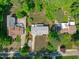 This aerial shot highlights the home's location in a peaceful neighborhood, backing up to wooded areas at 4109 Huckleberry Dr, Raleigh, NC 27612