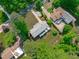 Aerial view of the home displaying the backyard, patio, and surrounding greenery at 4109 Huckleberry Dr, Raleigh, NC 27612