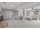 Spacious finished basement with neutral carpet, recessed lighting, and a comfortable sectional sofa at 4109 Huckleberry Dr, Raleigh, NC 27612