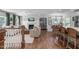 Bright and airy living room featuring hardwood floors, fireplace, and stylish furnishings at 4109 Huckleberry Dr, Raleigh, NC 27612