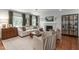 Cozy living area showcases a decorative fireplace, comfortable seating, and ample natural light at 4109 Huckleberry Dr, Raleigh, NC 27612