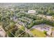Aerial view of property near W Chatham St, with mature trees surrounding the property in a neighborhood at 412 Madison Ave, Cary, NC 27513
