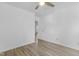 Minimalist bedroom featuring wood-look flooring and white walls at 413 Redpath Dr, Garner, NC 27529