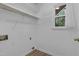 Laundry room with shelves and a window at 413 Redpath Dr, Garner, NC 27529