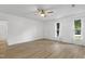 An open living room with bright walls, light floors and natural light at 413 Redpath Dr, Garner, NC 27529