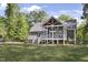 Charming home with screened porch, deck, and large backyard surrounded by mature trees at 413 Redpath Dr, Garner, NC 27529