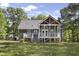 Charming home with screened porch, deck, and large backyard surrounded by mature trees at 413 Redpath Dr, Garner, NC 27529