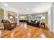 Finished basement featuring hardwood floors, comfortable seating, and ample natural light at 415 Forsyth St, Raleigh, NC 27609
