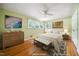 Inviting bedroom with hardwood floors, natural light, and neutral decor at 415 Forsyth St, Raleigh, NC 27609