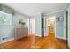Bedroom featuring an adjacent closet and wood floors at 415 Forsyth St, Raleigh, NC 27609