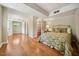 Bedroom with walk-in closet and finished hardwood floors at 415 Forsyth St, Raleigh, NC 27609