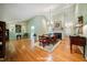 Bright living room with hardwood floors, fireplace, and ample seating at 415 Forsyth St, Raleigh, NC 27609