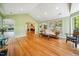 Cozy living room featuring hardwood floors, neutral paint, and lots of natural light at 415 Forsyth St, Raleigh, NC 27609
