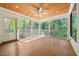 Screened in porch with wood ceiling and floor at 415 Forsyth St, Raleigh, NC 27609