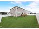 Spacious backyard with a well maintained lawn and a privacy fence at 4613 Jersey Pine Dr, Rolesville, NC 27571