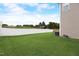View of backyard with privacy fence, and outdoor air conditioning unit at 4613 Jersey Pine Dr, Rolesville, NC 27571