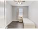 Bright bedroom features a single bed and hardwood floors at 4613 Jersey Pine Dr, Rolesville, NC 27571
