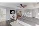 Bright main bedroom features ceiling fan, tv, closet and ensuite bath at 4613 Jersey Pine Dr, Rolesville, NC 27571