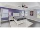 Spacious main bedroom with a tray ceiling, a ceiling fan, and plenty of natural light at 4613 Jersey Pine Dr, Rolesville, NC 27571