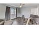 Home office features hardwood floors, a ceiling fan, and a large window at 4613 Jersey Pine Dr, Rolesville, NC 27571
