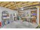 Unfinished basement area with exposed ceiling and concrete floors ready to be customized for storage and recreation at 4900 North Hills Dr, Raleigh, NC 27612