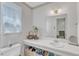Traditional bathroom with a single sink vanity at 4900 North Hills Dr, Raleigh, NC 27612