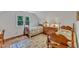 Bedroom with hardwood floors, two twin beds, a window, and lots of natural light at 4900 North Hills Dr, Raleigh, NC 27612
