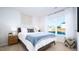 Bright bedroom with a comfortable queen-sized bed and large sunny windows at 493 Lochalsh Dr, Gibsonville, NC 27249