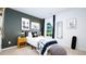 Nicely decorated bedroom featuring twin bed with a black and white theme at 493 Lochalsh Dr, Gibsonville, NC 27249