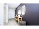 Comfortable hallway featuring a table, mirror, and decor at 493 Lochalsh Dr, Gibsonville, NC 27249