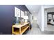 Inviting hallway decorated with a stylish table, mirror, and elegant decor at 493 Lochalsh Dr, Gibsonville, NC 27249