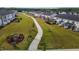 Scenic aerial view of the community showing well-maintained sidewalks and beautifully landscaped yards at 5054 Kota St, Raleigh, NC 27610