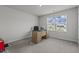 Spacious bedroom with neutral carpet and large windows, suitable for an office or guest room with ample natural light at 5054 Kota St, Raleigh, NC 27610