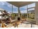 Inviting screened porch with comfortable seating, perfect for outdoor relaxation and enjoying the peaceful backyard view at 5054 Kota St, Raleigh, NC 27610