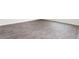 Attractive gray flooring in a room with baseboard trim is durable and easy to clean at 506 Lochalsh Dr, Gibsonville, NC 27249