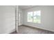 Bright office space with modern flooring and a large window at 506 Lochalsh Dr, Gibsonville, NC 27249