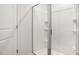 Frameless shower with white tile surround at 506 Lochalsh Dr, Gibsonville, NC 27249