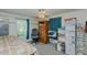 Bedroom featuring a ceiling fan, a window, a closet, and office furniture at 5100 Yale Ct, Graham, NC 27253