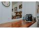 Open kitchen with butcher block countertop, with decoratively displayed dishes and glassware at 5100 Yale Ct, Graham, NC 27253