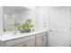 Modern bathroom showcases a double vanity, sleek mirrors, and neutral color palette, exuding style and sophistication at 511 Lochalsh Dr, Gibsonville, NC 27249