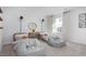Cozy bedroom featuring whimsical wallpaper, beanbag chairs, and natural light at 511 Lochalsh Dr, Gibsonville, NC 27249